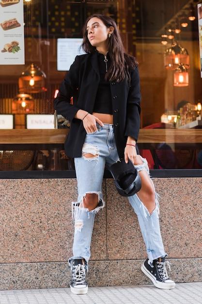 Can a 60 year old woman wear ripped jeans? 