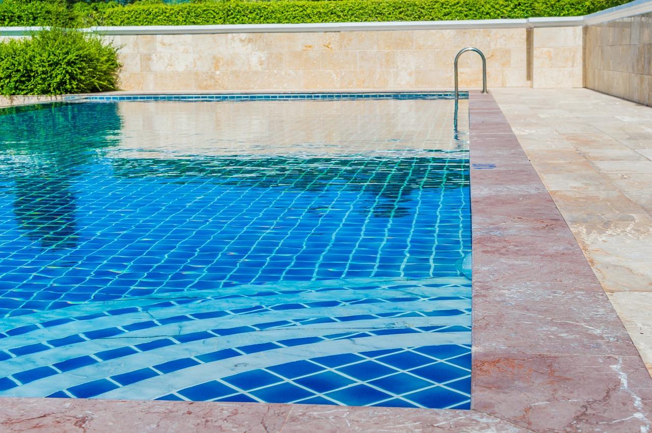 Can you power wash a Pebble Tec pool? 