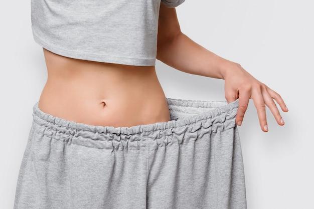 Does your stomach get bigger before it gets smaller? 