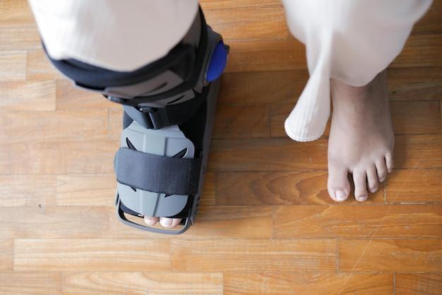 How does a moon boot help a fracture? 