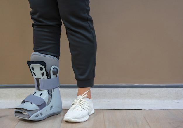 How does a moon boot help a fracture? 