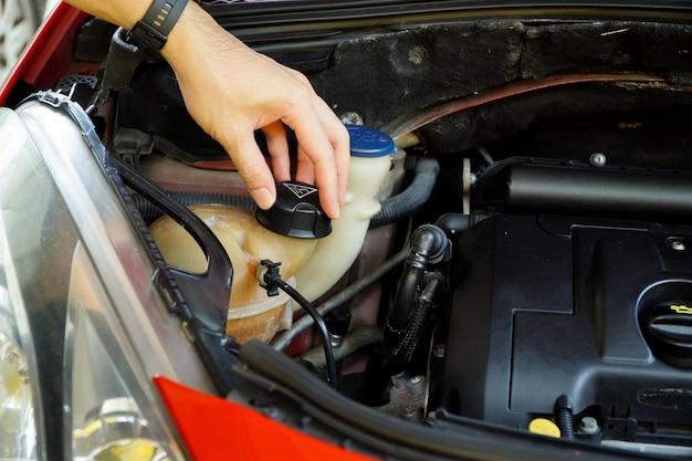 How long should I wait to start my car after adding coolant? 