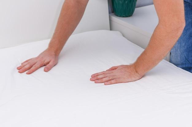 Do you put a fitted sheet over a mattress pad? 