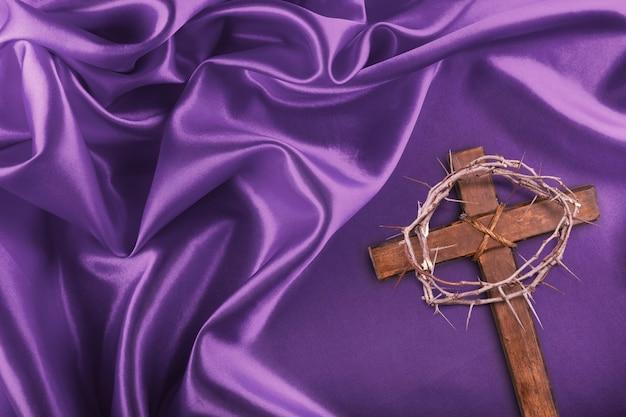 What does the purple robe on the cross mean 