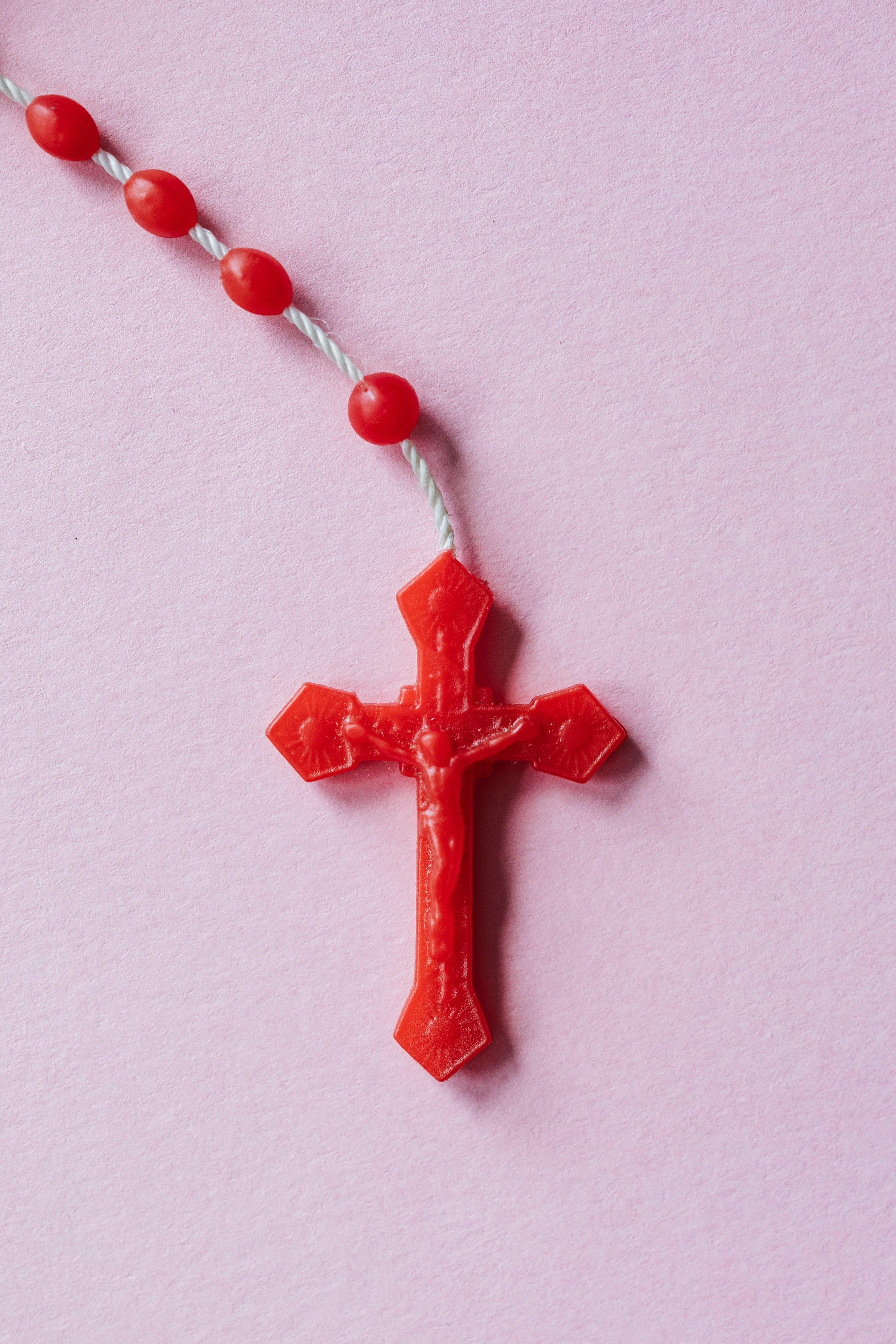 What does a red Rosary mean 