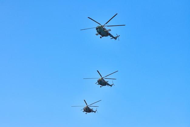 What does 3 helicopters flying together mean? 