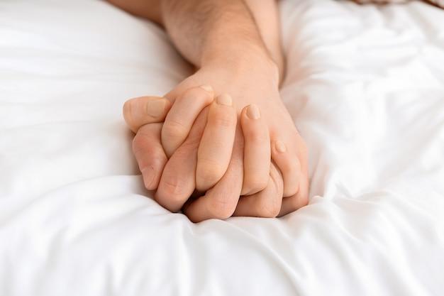 What does it mean when a guy holds your hand while sleeping 