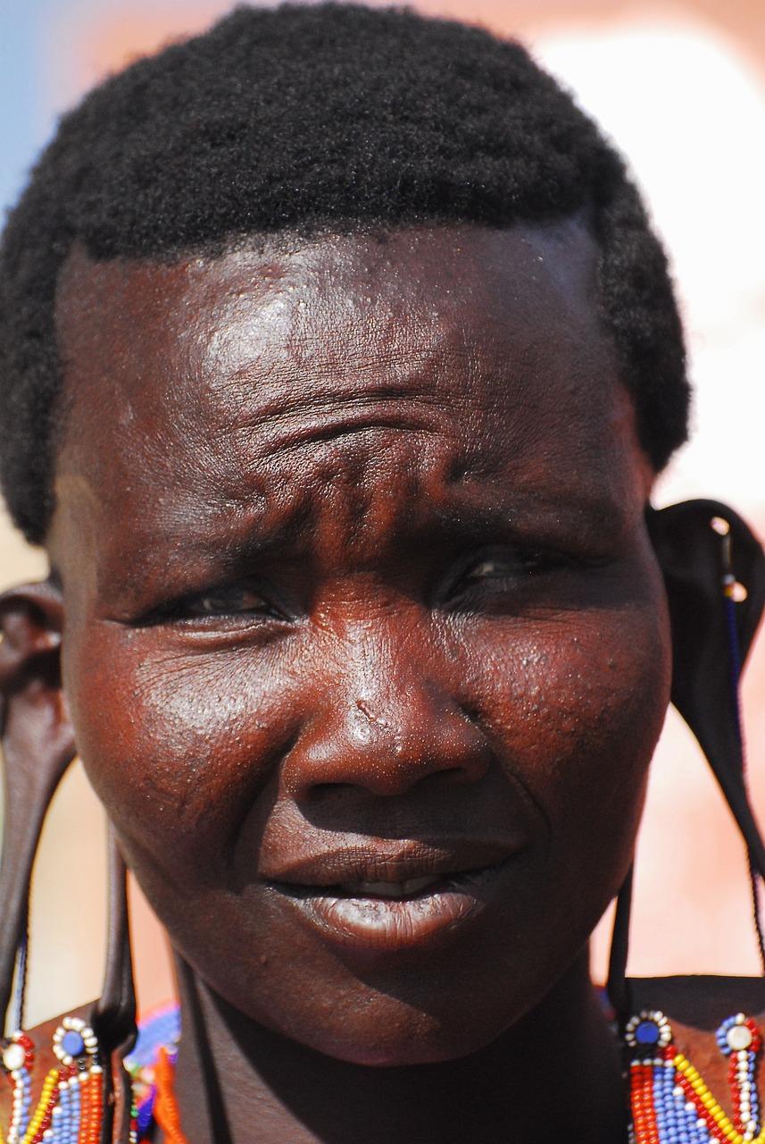 Why do African tribes stretch their ears? 