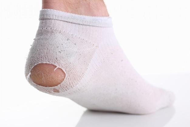 Why do guys socks get hard 
