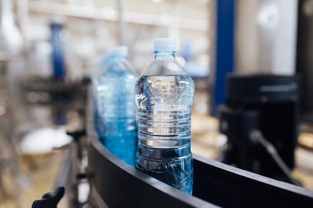 How many 16 oz bottle of water should I drink a day 