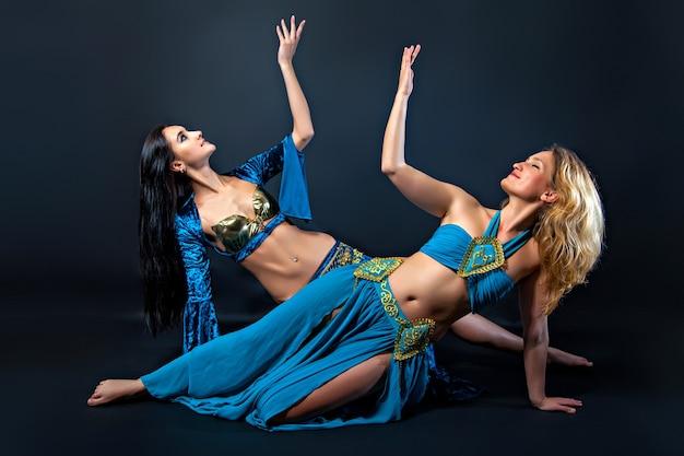 Why do belly dancers cover their face 