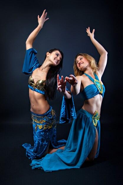 Why do belly dancers cover their face 